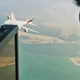 Illustration for article titled Watch A Giant Airbus A380 Slip Below This Helicopter With Little Room To Spare